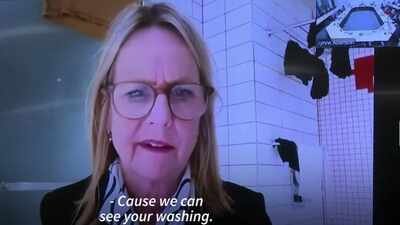 Pic credit: Screengrab from AFP YouTube video New Zealand councillor joins Zoom meeting from bathroom; colleagues say, ‘We can see your washing’