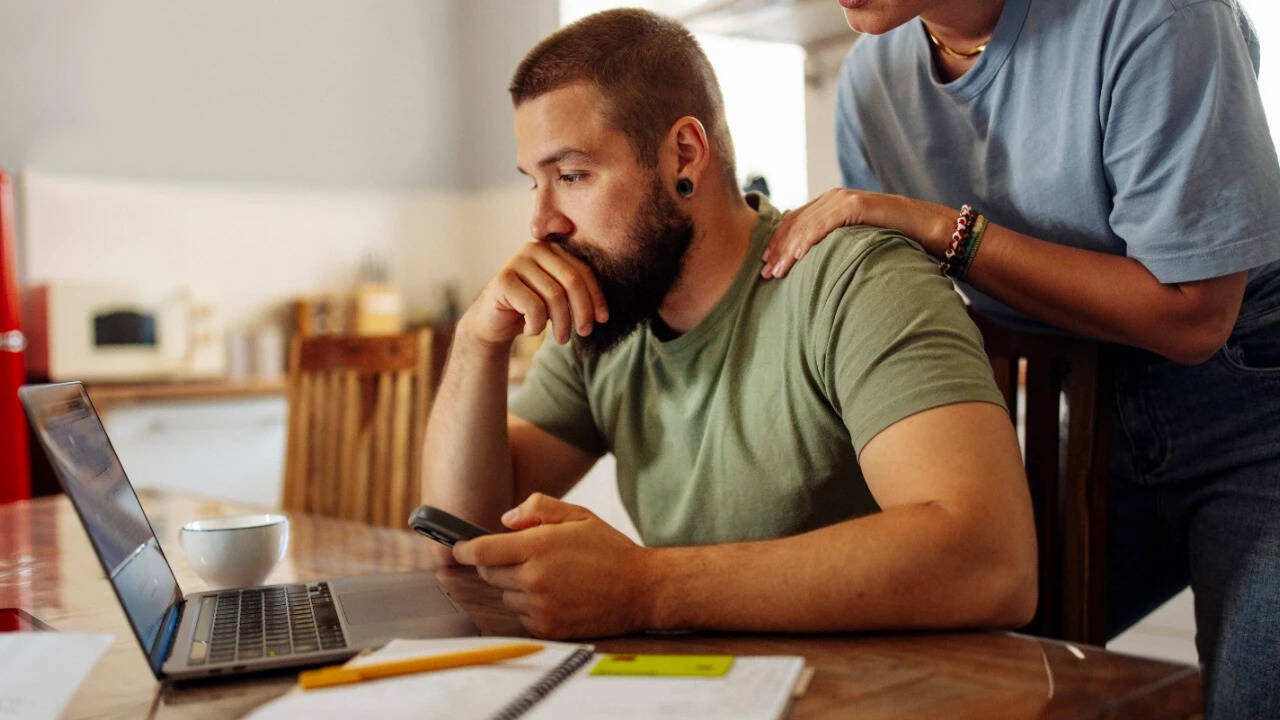 Years of financial stress damage your brain. Here's how