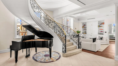 The buyer remains unknown. (Concierge Auctions) A gold-domed New York City penthouse first listed for $25 million has sold for $9 million after 530 days on the market, with owner Greg Carr directing the sale proceeds to his conservation project