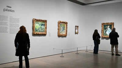 File Photo: Visitors look at works by Auguste Renoir (Representative Image) Another French heist: Thieves steal 4 paintings worth Rs 98 cr from Renoir museum; drop one while fleeing