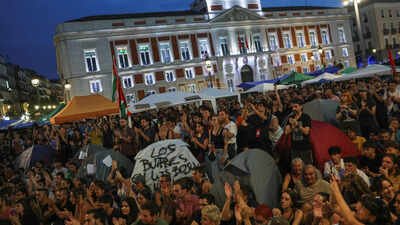 People react to a speech during a demonstration at a protest camp in Puerta del Sol square against Spain's housing crisis 87-year-old evicted, woman with chronic condition living in car: Why is Spain facing a housing crisis