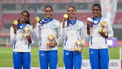 Gold medalist team India pose on the podium following the women's 4x400-meter relay final. (AP Photo) Asian Games 2026 Day 10: Neeru Dhanda, women’s 4x400m relay shine as 8-medal haul takes India past 50