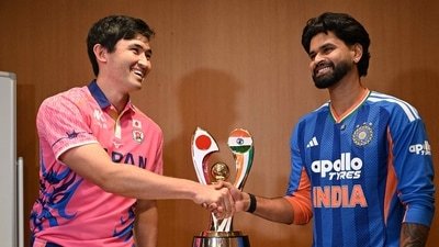 Shreyas Iyer shakes hands with Japanese captain Kendel Kadowaki-Fleming. (AFP)