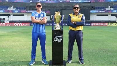 India captain Harmanpreet Kaur (L) and Sri Lanka skipper Chamari Athapaththu pose with the series trophy in Dubai on Saturday. (BCCI)