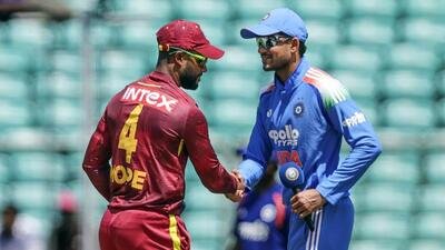 India's Captain Shubman Gill shakes hands with West Indies Captain Shai Hope before the start of the 1st ODI match between West Indies and India at the Greenfield International Stadium, in Thiruvananthapuram. (ANI Photo)