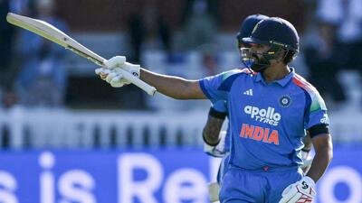 India's Rohit Sharma celebrates his century during the third one-day international (ODI) cricket match between England and India at Lord's cricket ground in London on July 19, 2026. (Photo by Glyn KIRK / AFP) / RESTRICTED TO EDITORIAL USE. NO ASSOCIATION WITH DIRECT COMPETITOR OF SPONSOR, PARTNER, OR SUPPLIER OF THE ECB (AFP)
