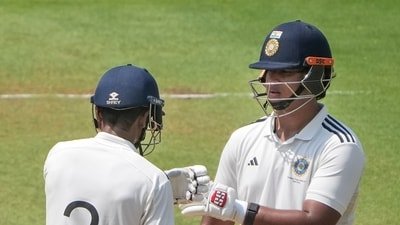 East Zone's Vaibhav Sooryavanshi, right, and Abhimanyu Easwaran greet each other between the wickets on day one of the Duleep Trophy 2026-27 final (PTI)