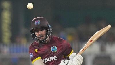 West Indies' Amir Jangoo during the second ODI against India in Guwahati on Wednesday. (AP Photo/Anupam Nath) West Indies' Amir Jangoo during the second ODI against India in Guwahati on Wednesday. (AP Photo/Anupam Nath)