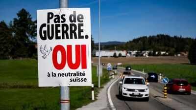 An electoral poster reads “No war, Yes to Swiss neutrality” is posted along a road in Epagny, Switzerland (AP) Switzerland's neutrality test puts Nato ties, Russia sanctions at stake