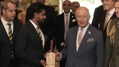 Photo/screengrab Babar Azam presents signed Pakistan team bat to King Charles III amid England tour turmoil