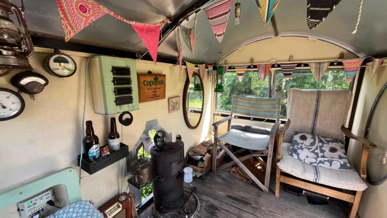 Backshall's garden contains a collection of authentic railway-related objects, including signs, signals and other equipment<br>