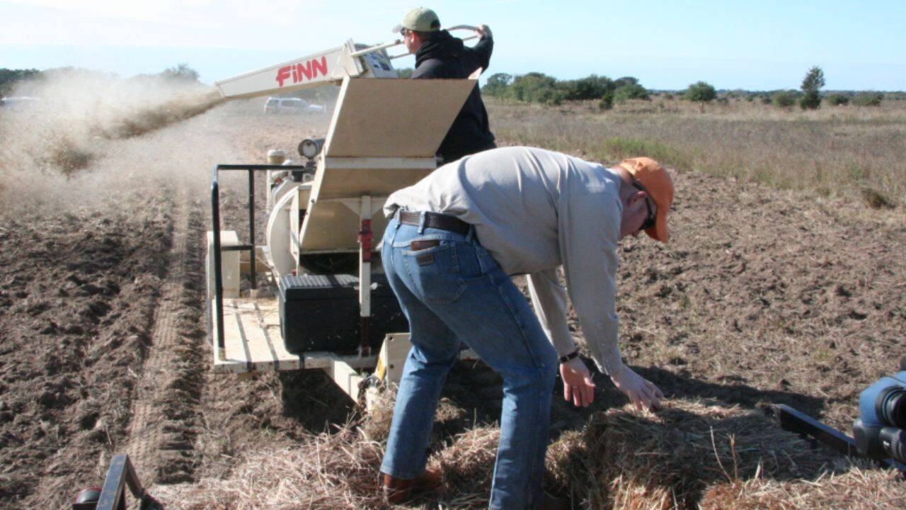 Bale Buster Dispersing Native Grass Seed on WW Ranch