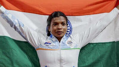 Baranica Elangovan poses after winning the bronze medal in the women's pole vault event. (PTI Photo) ‘No one will marry her’: Baranica Elangovan defies village taunts to make pole vault history at Asian Games