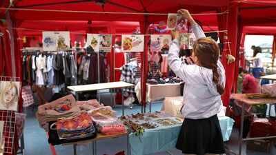 Pennsylvania's youth business fair grew from 60 booths in 2022 to 100 in 2026; kids ages 5 to 16 handled their own products, pricing and sales with no adults behind the tables
