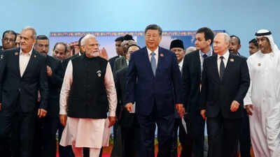 Iranian President Masoud Pezeshkian, Prime Minister Narendra Modi, Chinese President Xi Jinping, Russian President Vladimir Putin. India builds Brics without breaking up with US