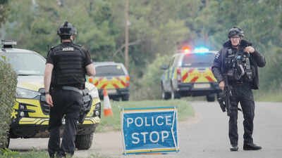 Police stand at a roadblock on the road to RAF Fairford after an incident, in Whelford, England (Picture credit: AP) Several arrested near UK’s RAF Fairford in explosives probe, US base on highest alert: Key details