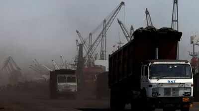 Trucks loaded with coal As stocks fall at power plants, govt mulls imported coal blending