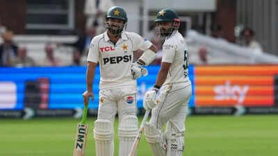Pakistan's Mohammad Rizwan, left, stands with batting partner Saud Shakeel (AP Photo) ‘Not a good decision’: Ex-Pakistan cricketer fumes at PCB, sends message to Mohsin Naqvi