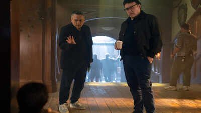 This image released by Marvel shows directors Joe Russo, left, and Anthony Russo on the set of "Avengers: Doomsday." (Paul Abell/Marvel-Disney via AP) Russo Brothers admit shooting 'Avengers: Doomsday' with unfinished script: 'We like to see what the actors bring to the characters'