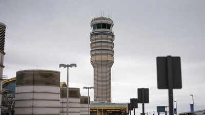 The Air Traffic Control tower at Ronald Reagan International Airport in Arlington, Virginia (Reuters image) Flights grounded at major US airports after construction workers cut backup cable