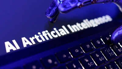 FILE PHOTO: Words "AI Artificial Inteligence", keyboard, and a robotic hand in this illustration taken June 5, 2026. A Maths teacher's social media post on English has gone viral in China, creating a huge debate on Chinese, AI and more