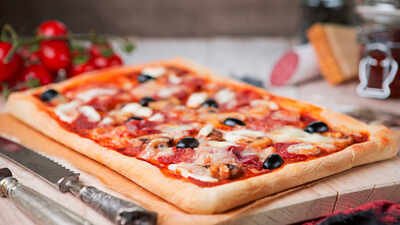 Regina style pizza has its own turf in the pizza world. It’s thicker and heavier than a New York slice, but lacks the deep, layered structure of Chicago deep-dish pizza. In 1970, four Greek brothers opened a Regina pizza shop; 56 years later their thick, square style has become a symbol of the Canadian city