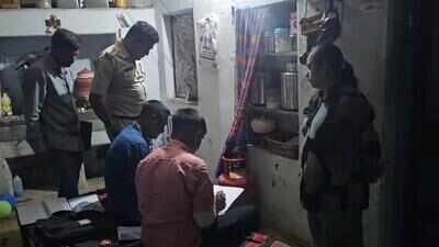 Police at the house where the murder-suicide took place in Hadida village of Amreli district Rajkot man kills 5-year-old daughter, stores body in fridge; ends life