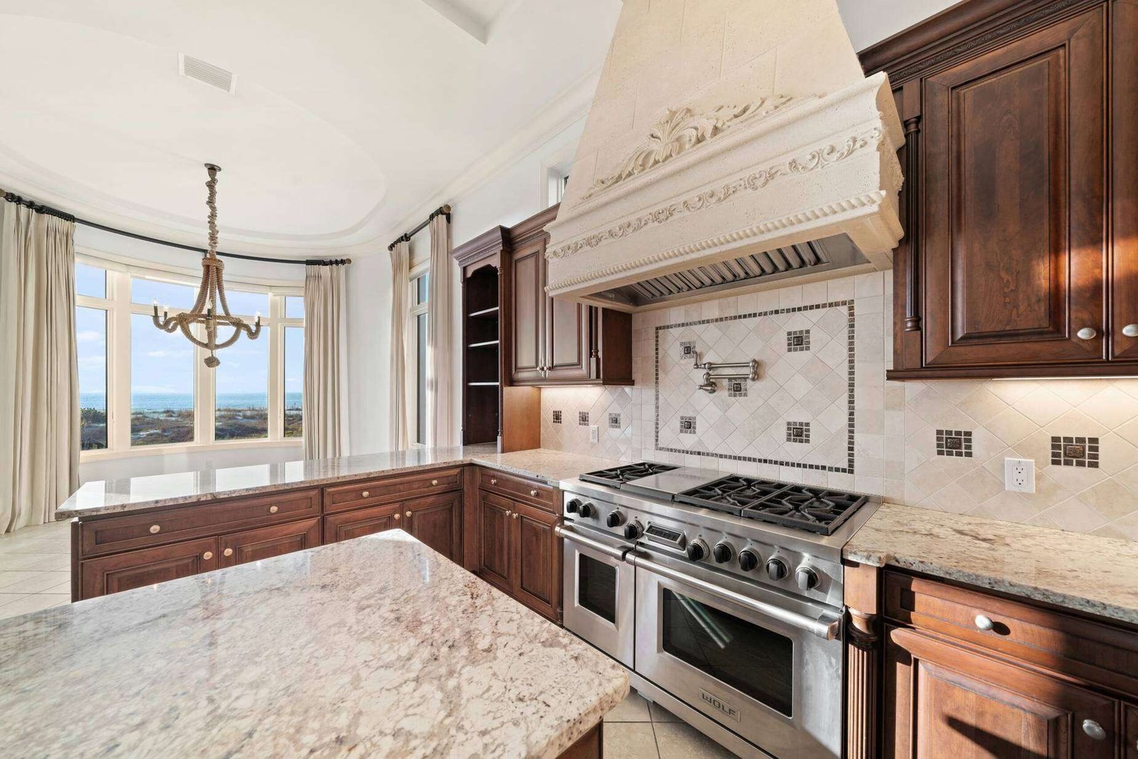 Hulk Hogan’s Florida mansion boasts Gulf views, a private elevator and a designer chef’s kitchen.