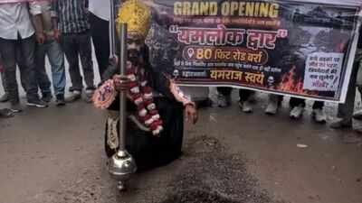 Kanpur residents protested rain-damaged roads by symbolically renaming a street Yamraj ka Dwar 'Road to hell': Fed up with potholes, Kanpur locals inaugurate 'Yamraj's Gate'