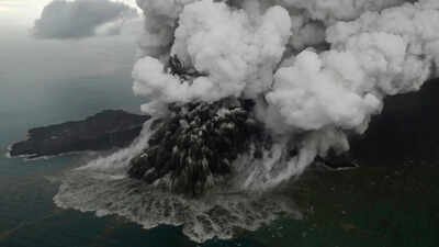 Plumes rise from Mount Anak Krakatau as it erupts in the Java Strait, Indonesia on Sunday. Photo credit: AP Krakatau volcano erupts in Indonesia: 209 flights hit, schools shut as ash plume soars 50,000 feet