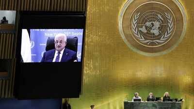 Palestinian President Mahmoud Abbas appears on a screen as he addresses the 80th United Nations General Assembly (UNGA) US extends visa curbs on Palestine officials, blocks President Abbas from UN General Assembly