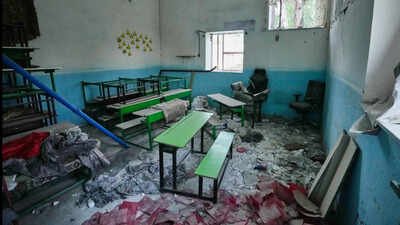 Classroom desks and chairs sit amid rubble at the Shajareh Tayyebeh school, damaged in a Feb 28 US airstrike in Minab (Photo: AP) US committed war crimes in 2 deadly strikes in Iran; Tehran committed crimes against humanity: UN