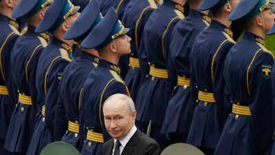 File photo: Russian President Vladimir Putin attends a wreath-laying ceremony at the Tomb of the Unknown Soldier by the Kremlin wall in Moscow Putin tightens grip on Russian elections with anti-war opposition squeezed out