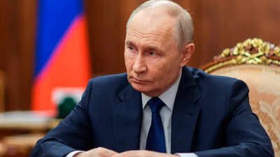 File photo: Russian President Vladimir Putin at the Kremlin in Moscow Nestle 'assessing options' after Putin places Russian assets under state control