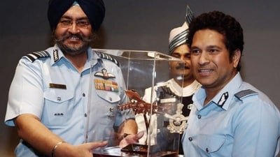 Sachin Tendulkar shared a picture from the time he met Air Chief Marshal BS Dhanoa. Sachin Tendulkar shared a picture from the time he met Air Chief Marshal BS Dhanoa.