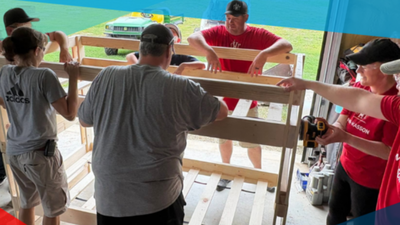 Sleep in Heavenly Peace's message: “No Kid Sleeps on the Floor in Our Town” (Image Credit: SHP) In 2012, an Idaho man built one bed in his garage for a child sleeping on the floor; 14 years later, the idea has delivered nearly 396,000 beds through 400+ chapters