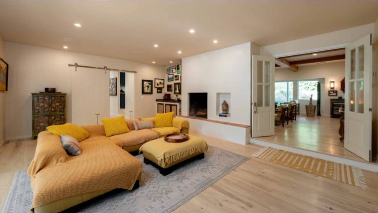 The interiors feature exposed wooden beams, handcrafted furnishings, artisan tile and a Caribbean-inspired colour palette