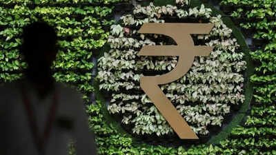 File photo: A man walks past an Indian Rupee symbol installation at the Reserve Bank of India (RBI) headquarters in Mumbai (Picture credit: Reuters) Rupee falls 0.4% to 95.96 against dollar, sharpest single-day drop in two months
