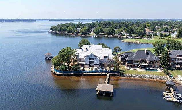 The structure and roof of Michael Jordan’s new Lake Norman mansion appear complete as aerial pictures reveal the luxury estate’s progress.