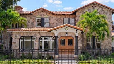 A 1937 Florida home was converted into law offices and once slated for demolition; after nearly 7,800 restoration hours, the 4,000-square-foot house is a residence again and listed for $3.5 million