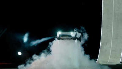 Tesla unveils its long-delayed Roadster nearly a decade after first revealing a next-generation version of its original electric sports car, at a launch event in Texas, US, on October 15, 2026, in this still image taken from a handout video. (Photo credit: Tesla) Watch: Elon Musk's Tesla unveils Roadster with flying-car-like features