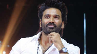 Actor Dhanush’s organisation has unveiled a new flag and logo and plans to establish a grassroots network across five assembly constituencies in Coimbatore. Is Dhanush ready to make his political debut? Fan club's new avatar sparks buzz