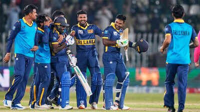 Sri Lanka's Janith Liyanage, second right, and Asitha Fernando, third left, celebrates with teammates. (AP Photo) 93 fours, 552 boundary runs! All the major records as Sri Lanka pull off historic ODI chase against England