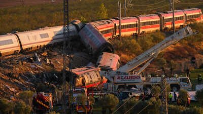 Emergency services work at the scene of a collision between two trains in Urda, Spain Red signal, system failure, fatal impact: How Spain’s train collision unfolded