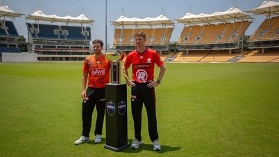 Jhye Richardson and Brendan Doggett with the BBL trophy in Chennai. (AP) Jhye Richardson and Brendan Doggett with the BBL trophy in Chennai. (AP)