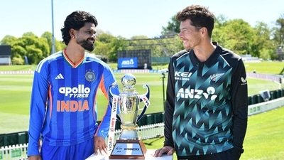 Mitchell Santner (R) and India's Shreyas Iyer pose with the trophy (AFP) Mitchell Santner (R) and India's Shreyas Iyer pose with the trophy (AFP)
