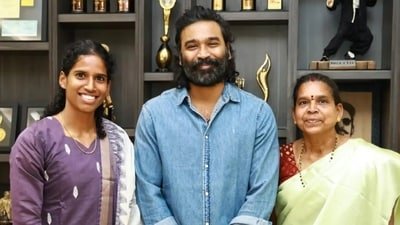 Dhanush meets Vithya Ramraj after her three-medal Asian Games haul. Dhanush meets Vithya Ramraj after her three-medal Asian Games haul.