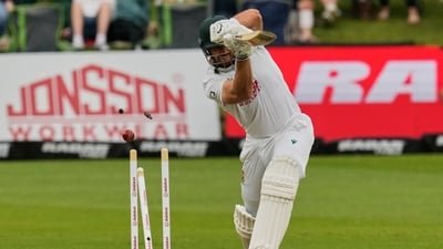 South Africa's Aiden Markram is bowled out by Australia's Scott Boland. (AP Photo/Themba Hadebe)