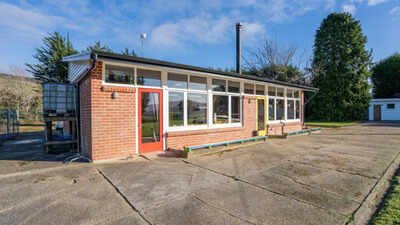 Pic credit:TRADE ME A New Zealand couple bought an abandoned school, then spent three years and about NZ$250,000 turning the classroom into a home and chalet; the property is now listed for enquiries over NZ$595,000