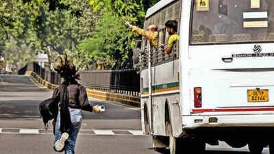 A journalist runs after a police bus that was carrying several detained scribes Several journalists detained during CJP protest despite IDs